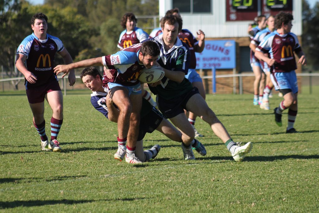 TEAM EFFORT: Gremlins players Andrew Thorne and Jason John work together to bring down their Goondiwindi Maroon opponent. TEAM EFFORT: Gremlins players Andrew Thorne and Jason John work together to bring down their Goondiwindi Maroon opponent.